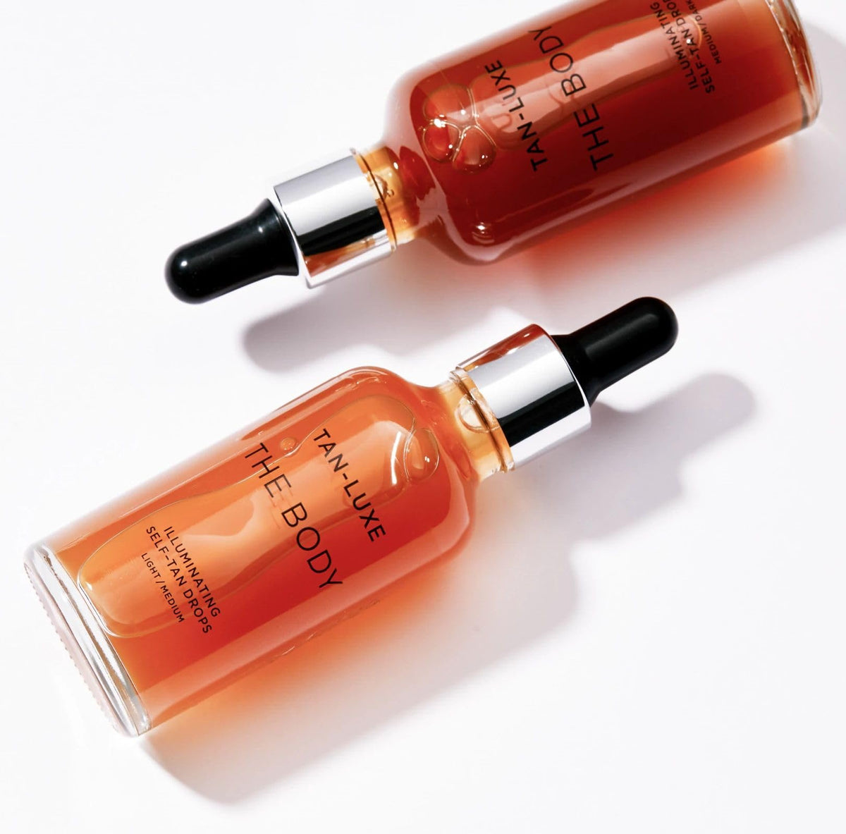 TAN-LUXE bottle on bathroom vanity in a lifestyle scene showing effortless daily integration