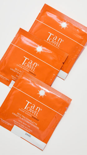 Tan Towel being applied to leg in lifestyle setting for quick, streak-free color