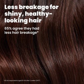 TANGLE TEEZER spreading conditioner evenly through hair for smoother results
