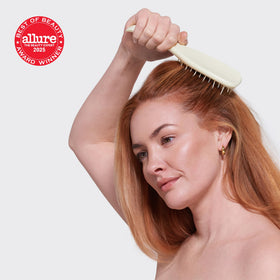 TANGLE TEEZER detangling action on long hair illustrating reduced pulling