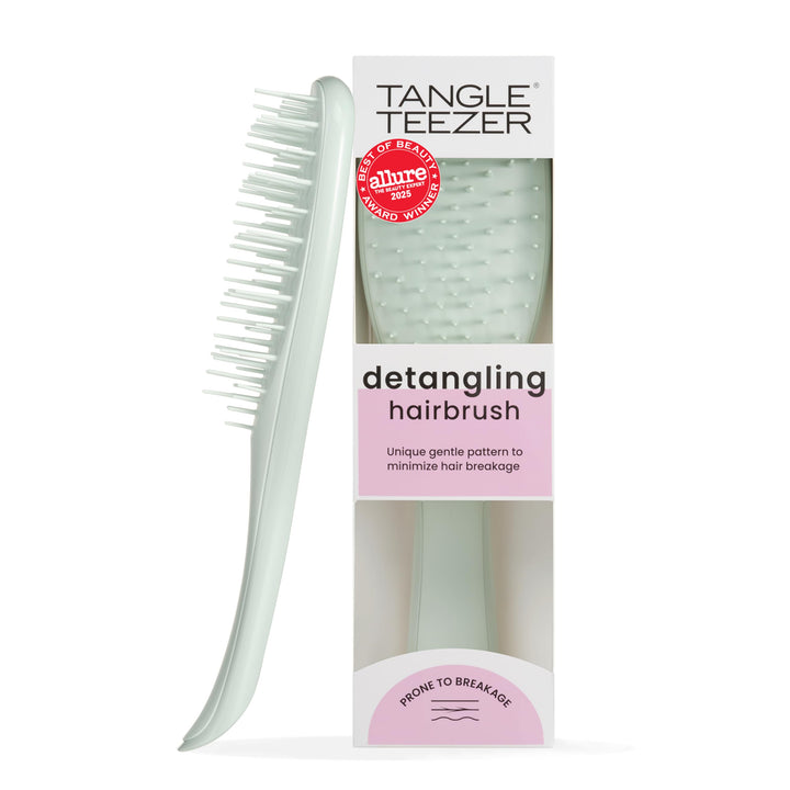 TANGLE TEEZER front view showing eucalyptus green compact brush and gentle grip benefit