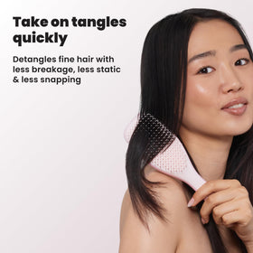 TANGLE TEEZER back profile displaying durable plastic shell for shower use
