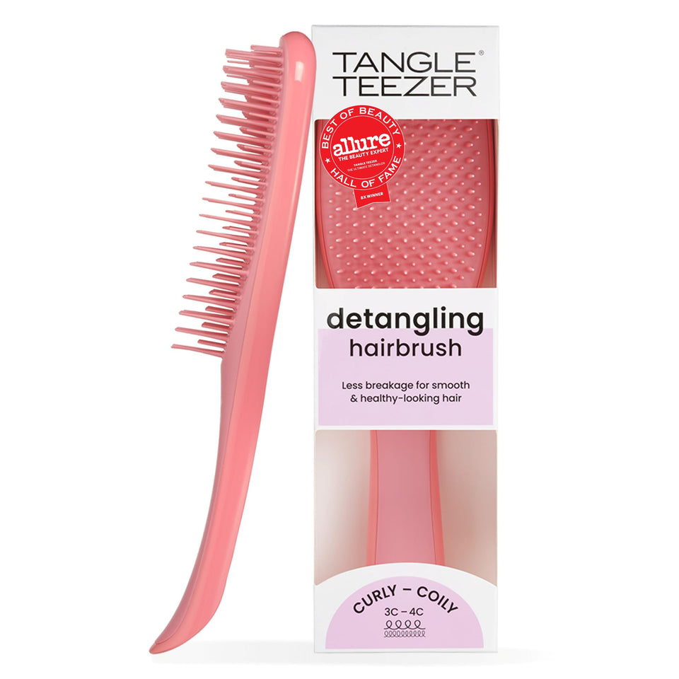 TANGLE TEEZER front view coral pink brush showing compact ergonomic shape and easy grip