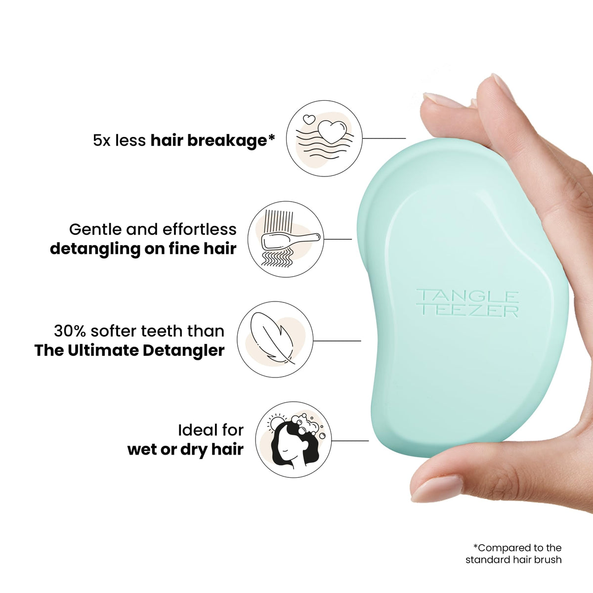 TANGLE TEEZER shown in hand demonstrating palm-friendly grip and gentle detangling benefit