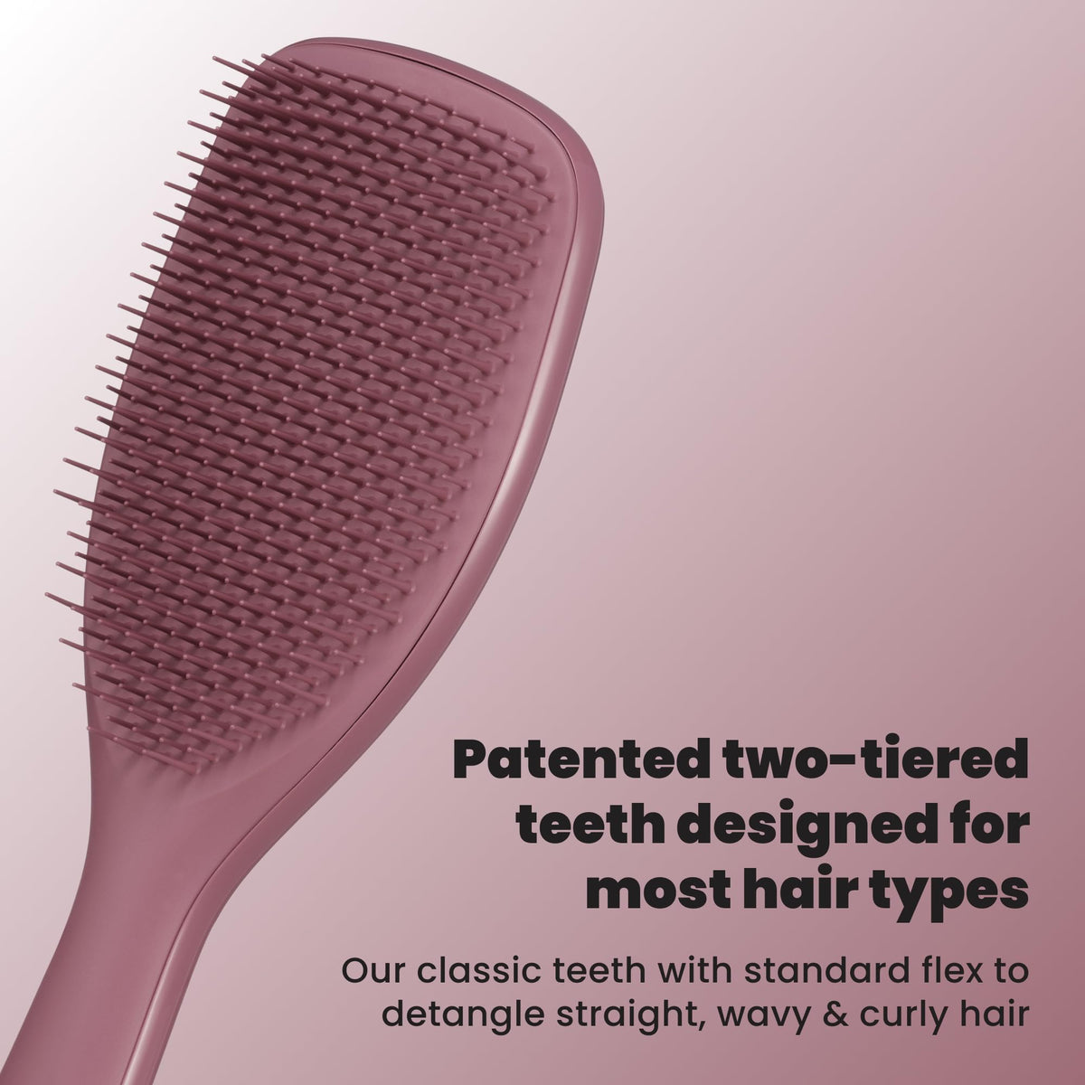TANGLE TEEZER close-up of two-tiered teeth, detangles knots with less breakage