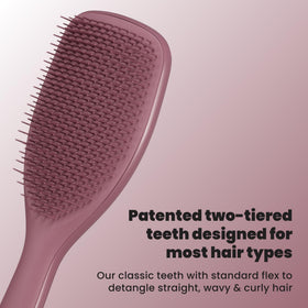 TANGLE TEEZER close-up of two-tiered teeth, detangles knots with less breakage