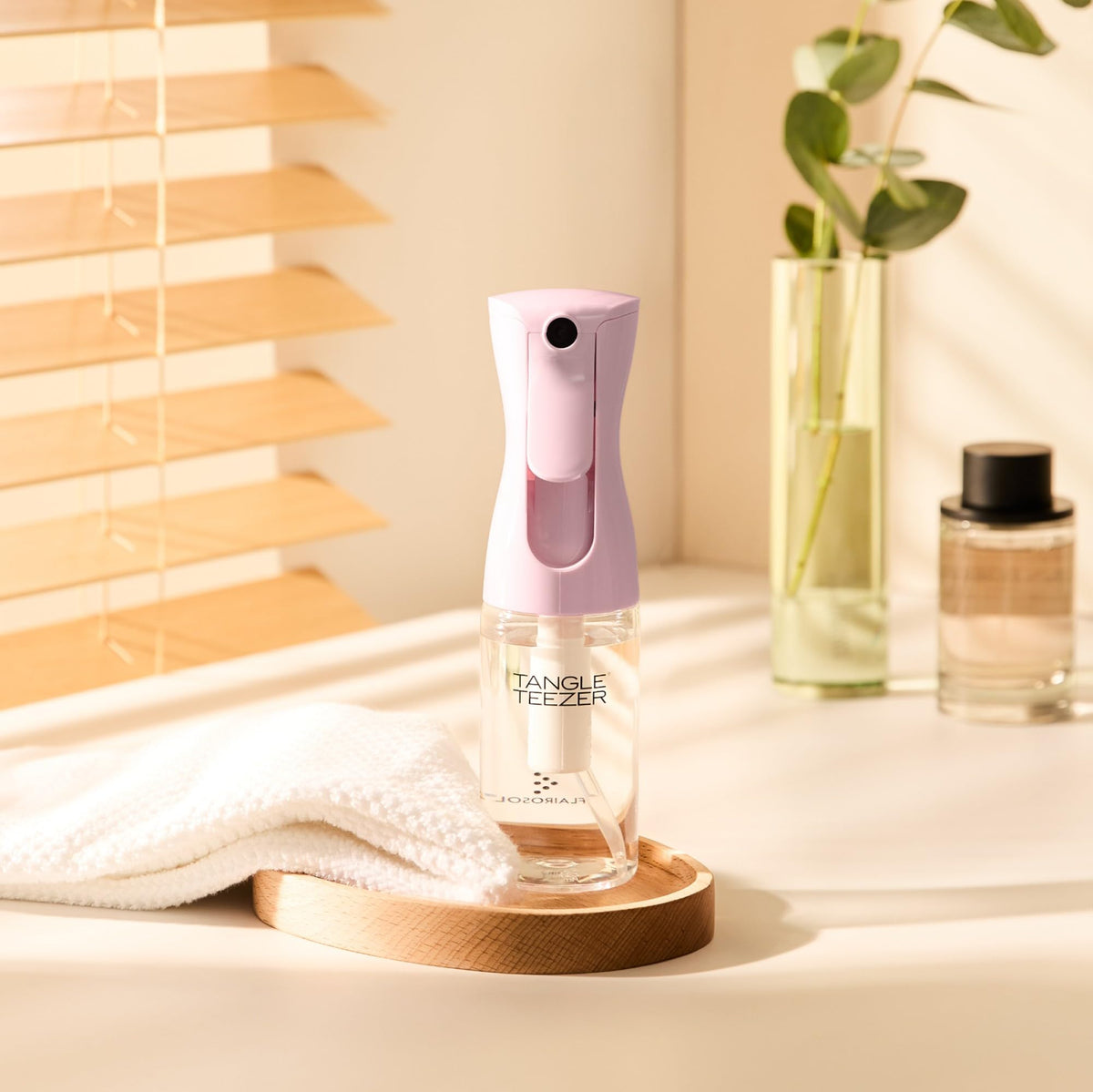 TANGLE TEEZER in travel vanity scene for on-the-go refresh and styling benefit