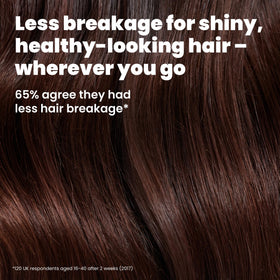 TANGLE TEEZER brushing dry hair to show frizz reduction and polished finish