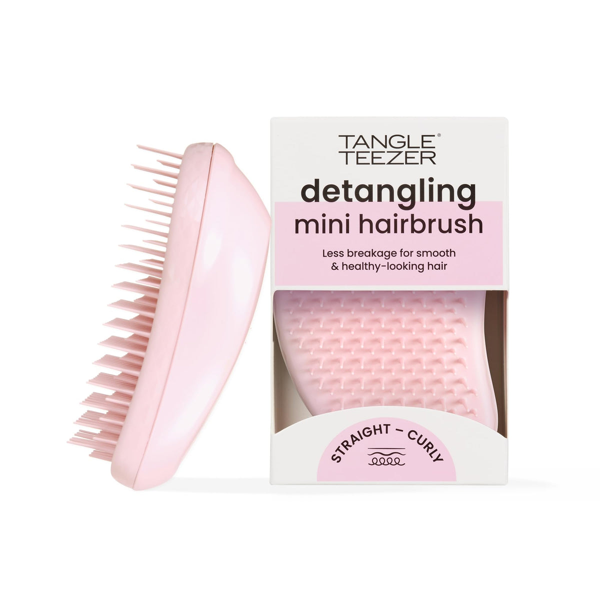 TANGLE TEEZER mini front view showing compact size and bright millennial pink finish, easy to pack
