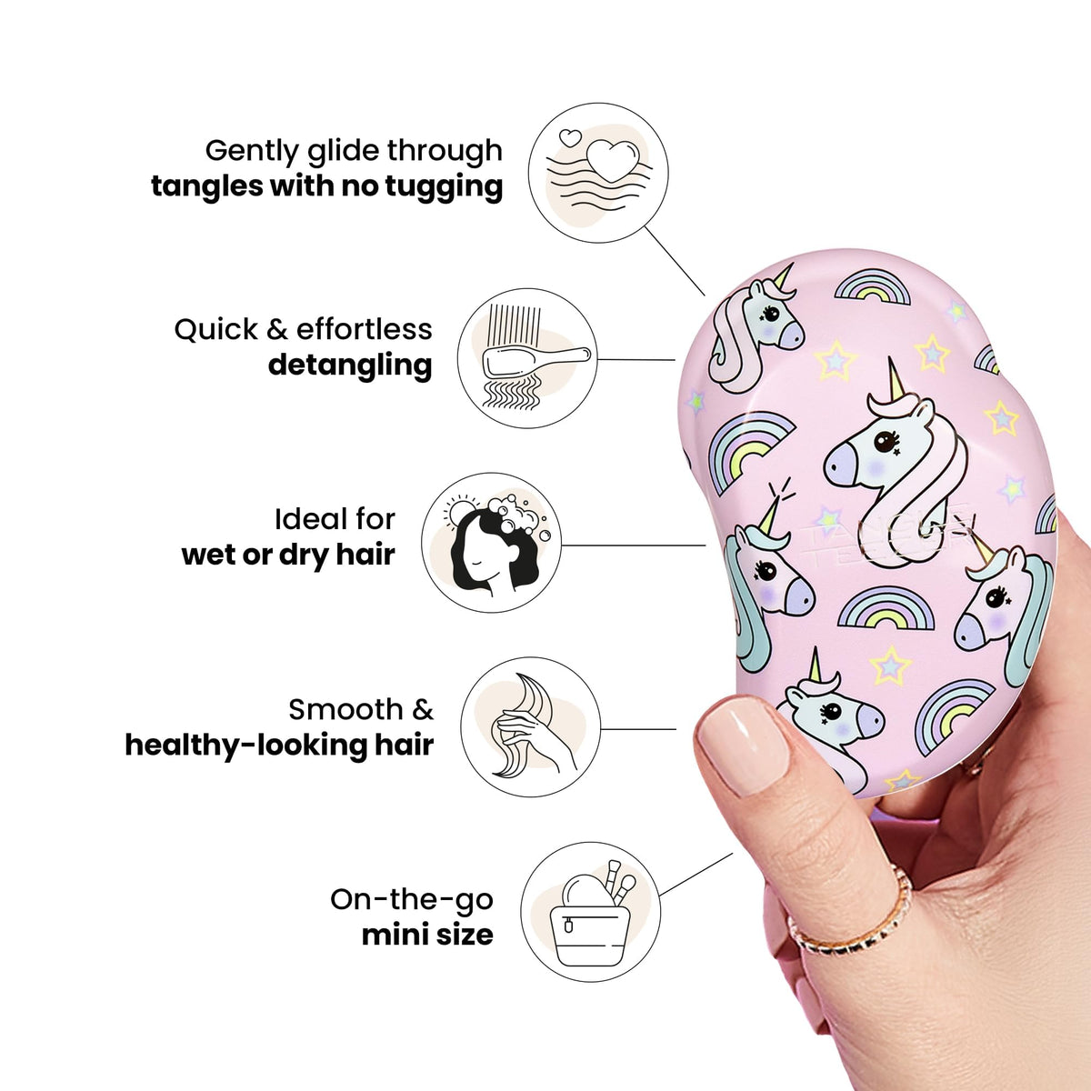 TANGLE TEEZER held in child’s hand showing kid-friendly size