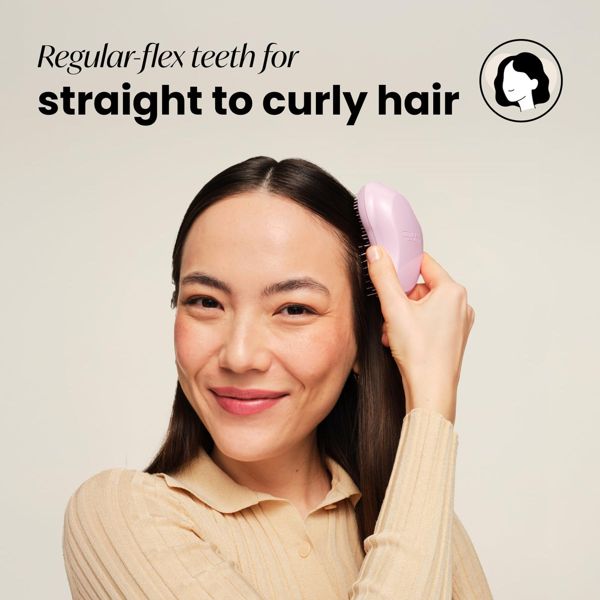 TANGLE TEEZER side profile highlighting ergonomic palm grip for comfortable control