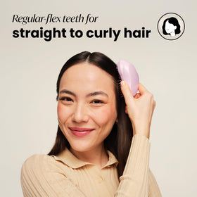 TANGLE TEEZER side profile highlighting ergonomic palm grip for comfortable control