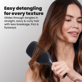 TANGLE TEEZER teeth meeting scalp to show regular-flex design that reduces tugging