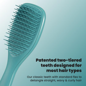TANGLE TEEZER side profile of travel-size brush highlighting portability