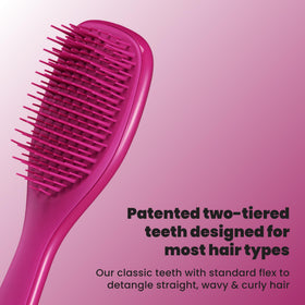 Tangle Teezer close-up of two-tiered teeth showing gentle detangling action