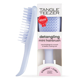 TANGLE TEEZER front view of travel brush showing compact shape and color benefit of portability