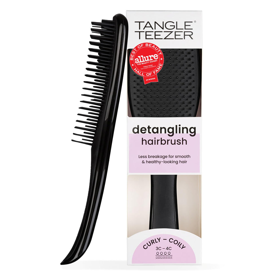 TANGLE TEEZER front view showing ergonomic shape and red finish for easy grip