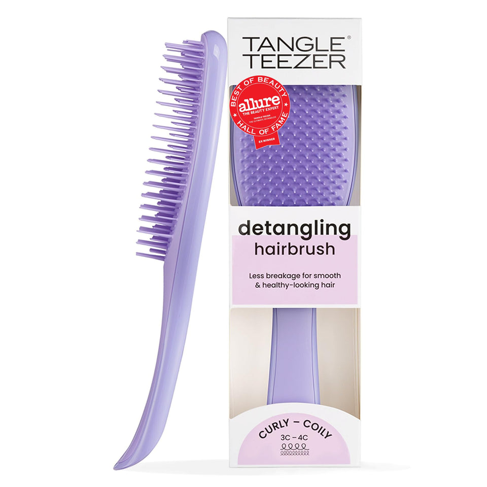 TANGLE TEEZER front view showing purple brush and ergonomic shape benefiting easy grip