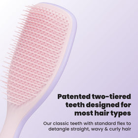 TANGLE TEEZER side profile highlighting large paddle and tapered edges for comfortable handling