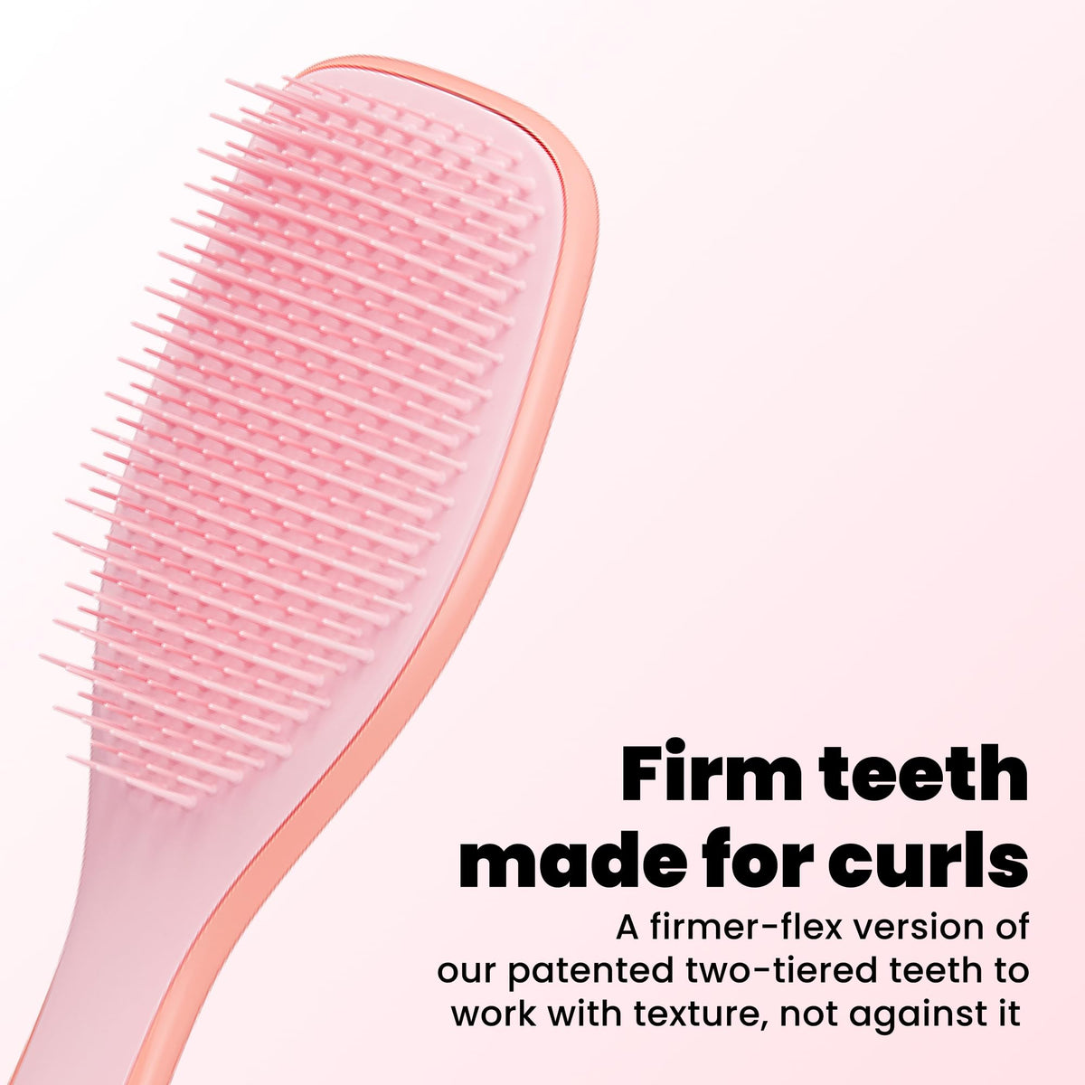TANGLE TEEZER closeup of two-tiered teeth, firm-flex teeth that gently detangle thick curls