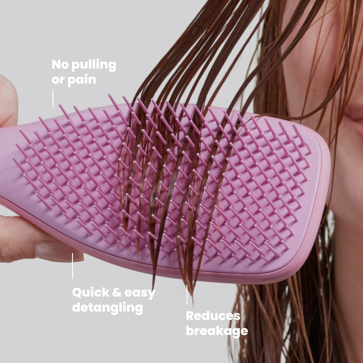 TANGLE TEEZER brushing damp hair to detangle knots with less breakage benefit