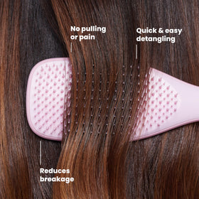 TANGLE TEEZER brushing wet hair, reducing tugging and protecting fragile strands