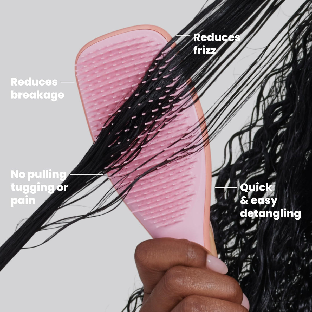 TANGLE TEEZER in shower on wet curly hair, evens conditioner and detangles safely