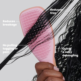 TANGLE TEEZER in shower on wet curly hair, evens conditioner and detangles safely