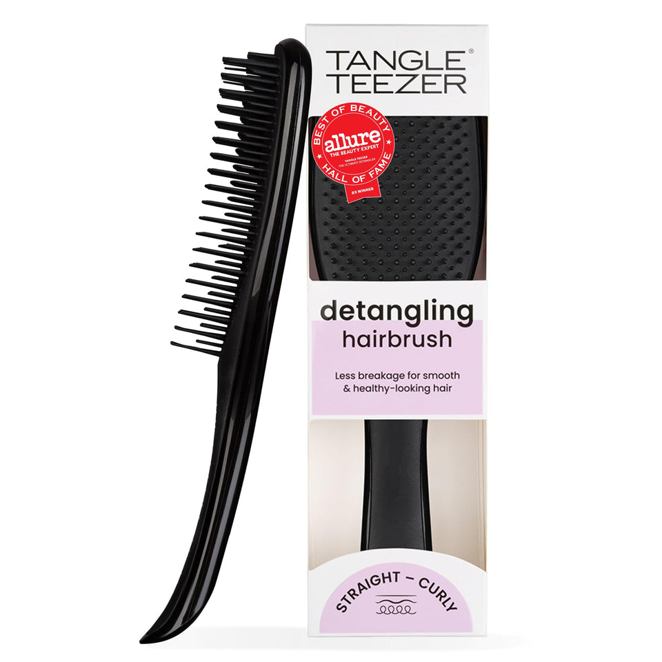 TANGLE TEEZER front view showing compact black detangler, quick knot removal
