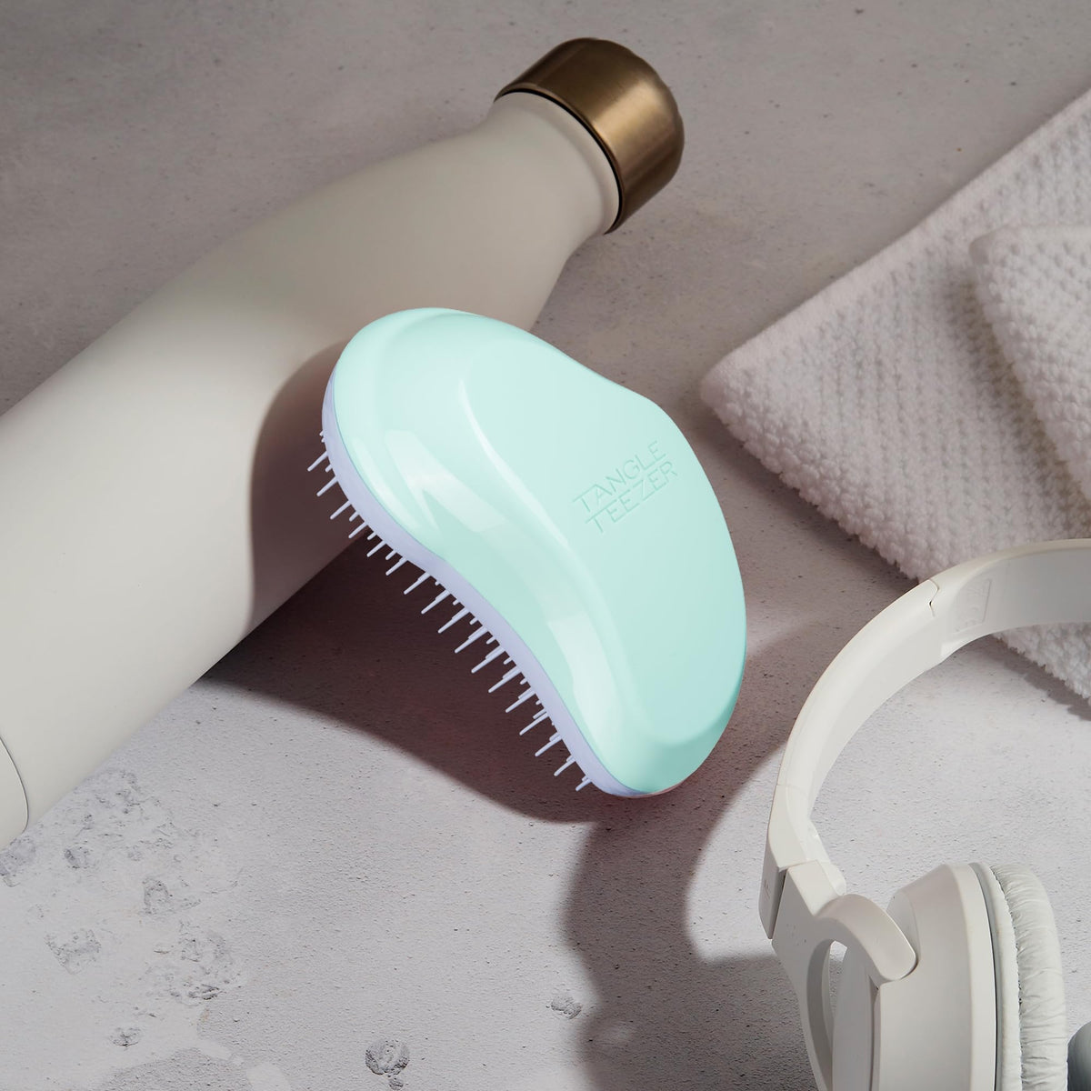 TANGLE TEEZER used on wet hair with conditioner to reduce tugging and minimize breakage