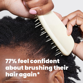 TANGLE TEEZER being used on wet hair with conditioner to reduce tension