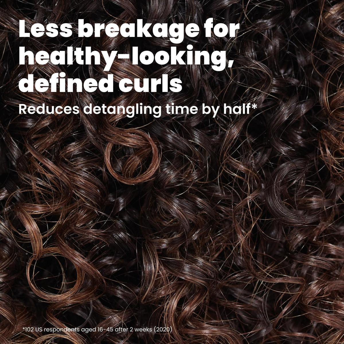 TANGLE TEEZER being used in the shower to detangle wet curls and distribute conditioner