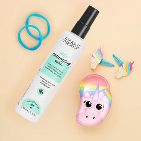 TANGLE TEEZER paired with a detangler brush for smoother styling