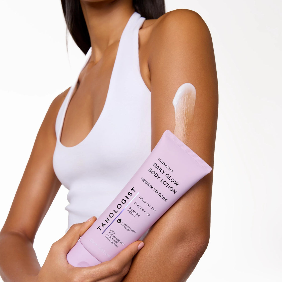 Vitamin C and cherry extract visuals with Tanologist highlighting brightening benefits