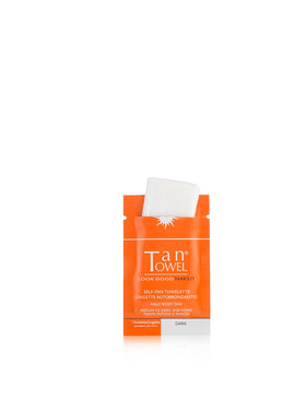 TanTowel close-up wipe texture highlighting clear liquid and even application benefit