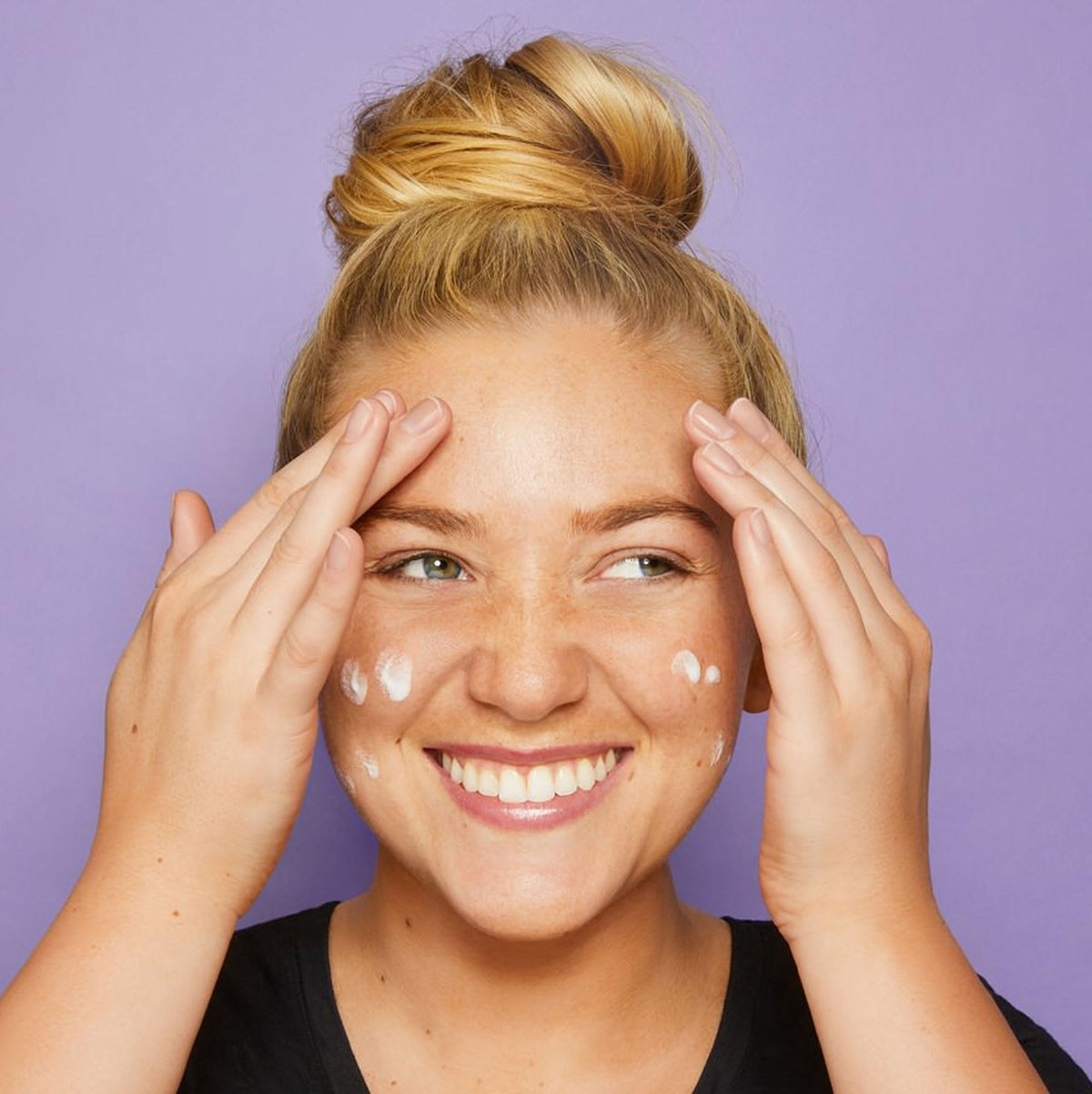 tarte primer spread on hand, showing smoothing effect and quick absorption benefit