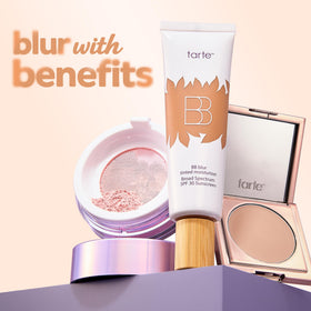 tarte on bathroom vanity styled with brush and mirror showing everyday routine