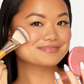tarte blush applied on cheeks lifestyle image showing natural, airbrushed radiance