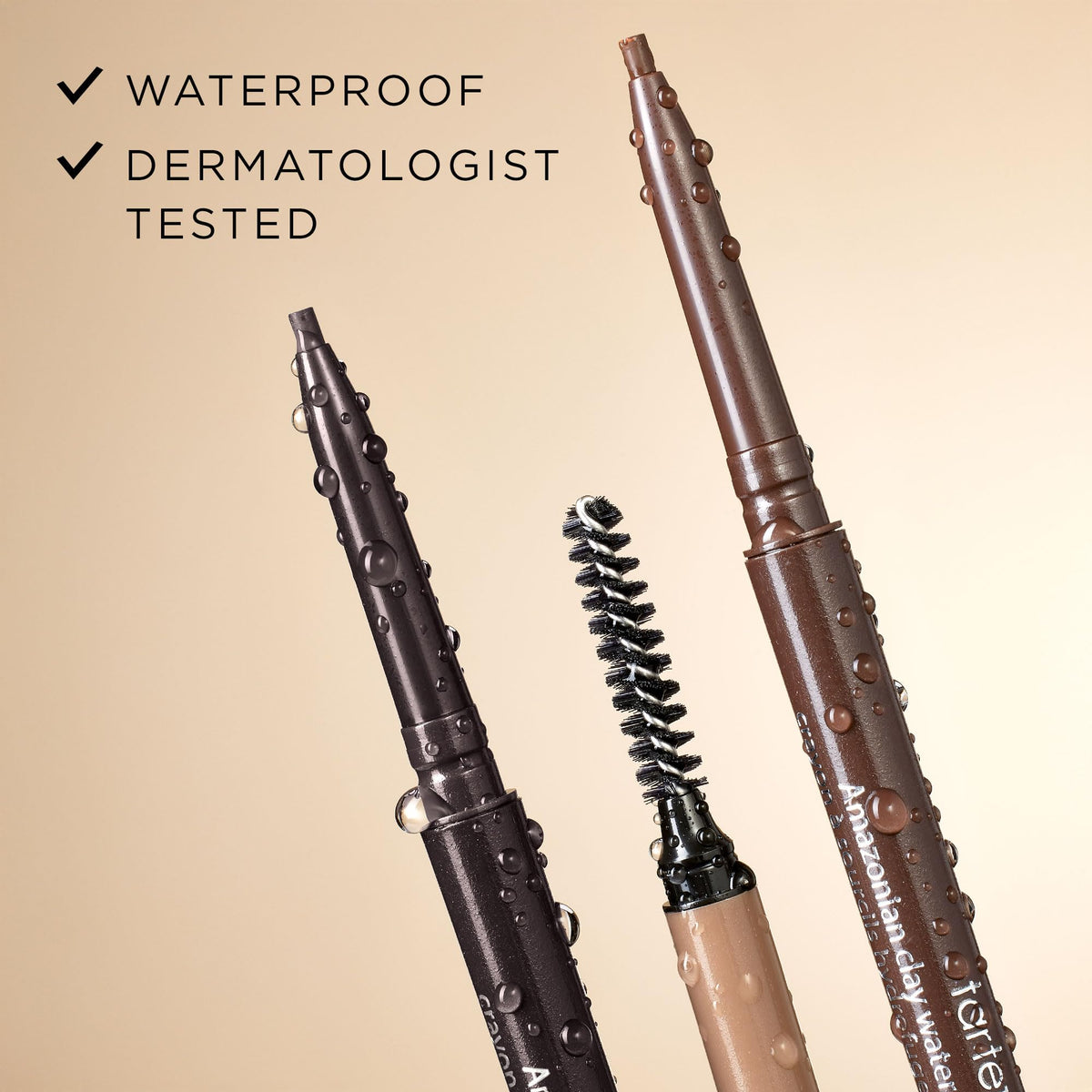tarte pencil held in hand showing scale and easy travel-friendly size