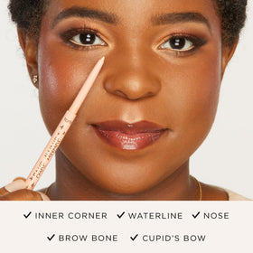 tarte dot of pencil on inner corner creating visible light reflection