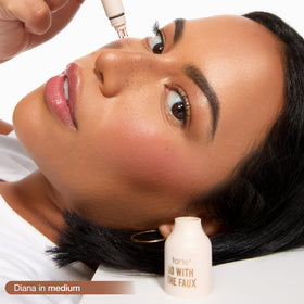 tarte close-up of the five-pronged applicator revealing dot pattern for natural-looking freckles