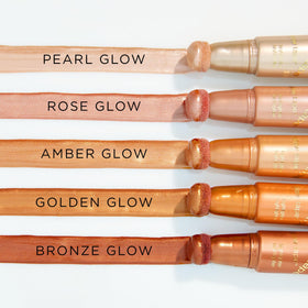 tarte swiped pearl glow streak on skin, demonstrates buildable reflective finish