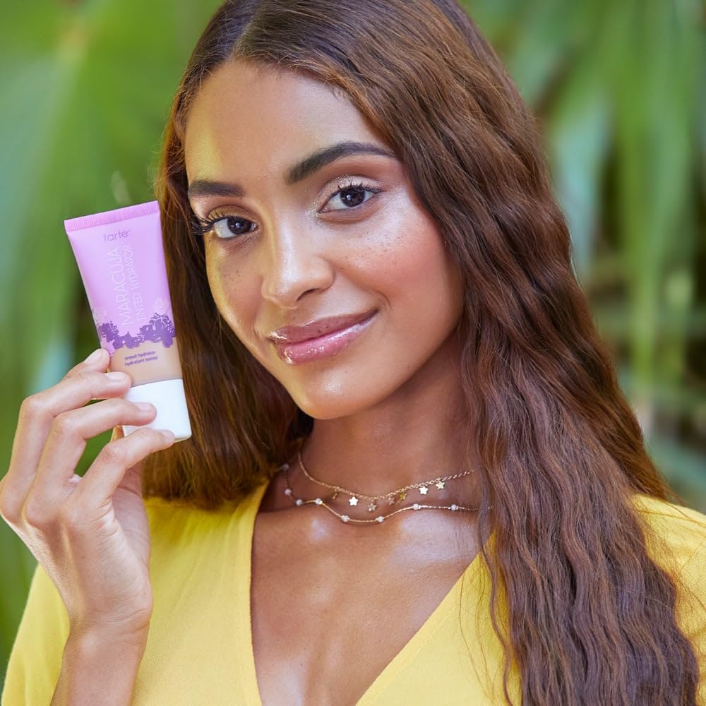 tarte maracuja product swatches on arm illustrating buildable coverage