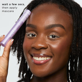 tarte primer in a packed toiletry bag, suggests easy portability for touch-ups