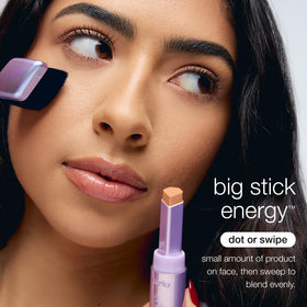 tarte brush on vanity with makeup, demonstrating professional finish