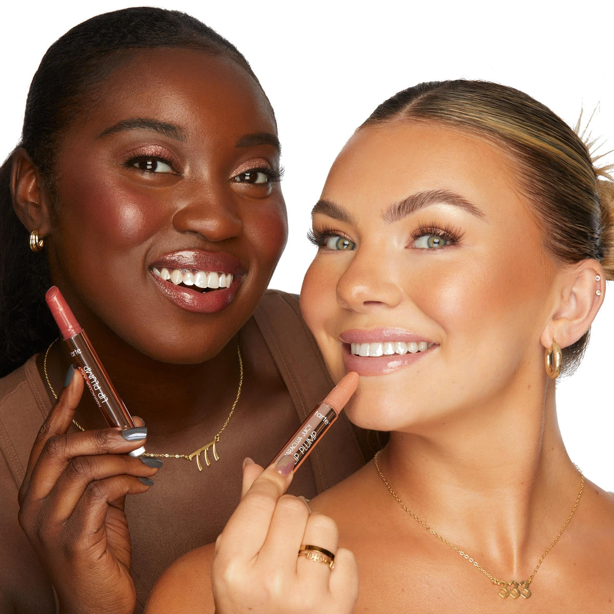tarte model wearing gloss in lifestyle scene showing hydrated, luminous lips