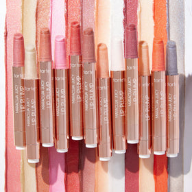 tarte size comparison with coin conveying full-size product portability benefit