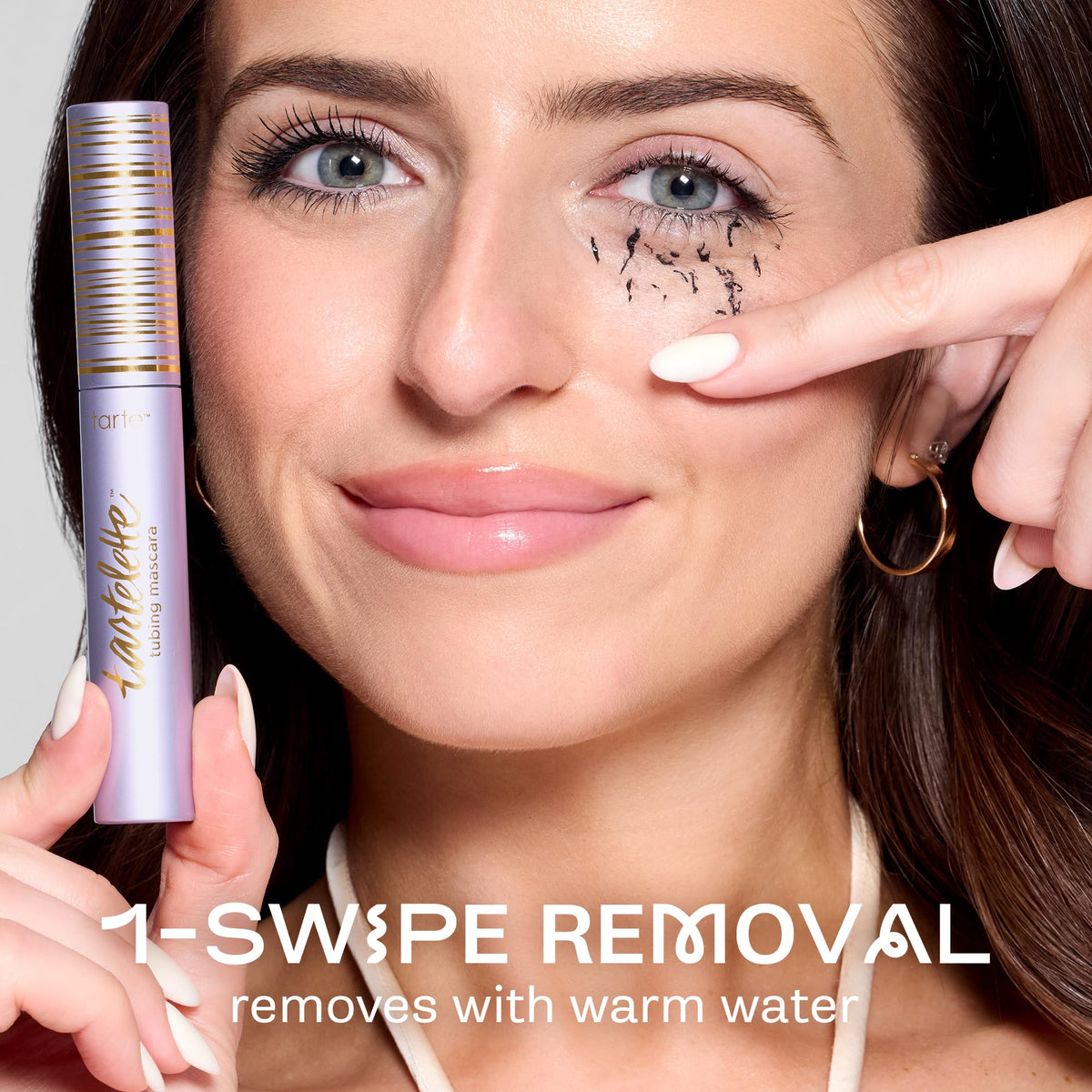 tarte travel-size mascara held in hand for portability and convenience