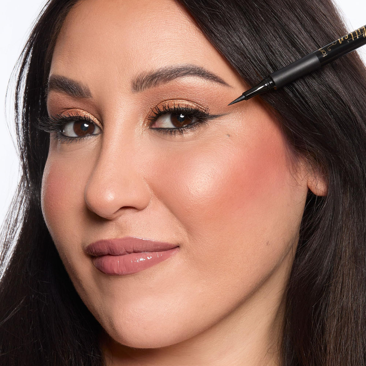 tarte winged eye in use demonstrating sharp cat-eye definition and long-wear benefit