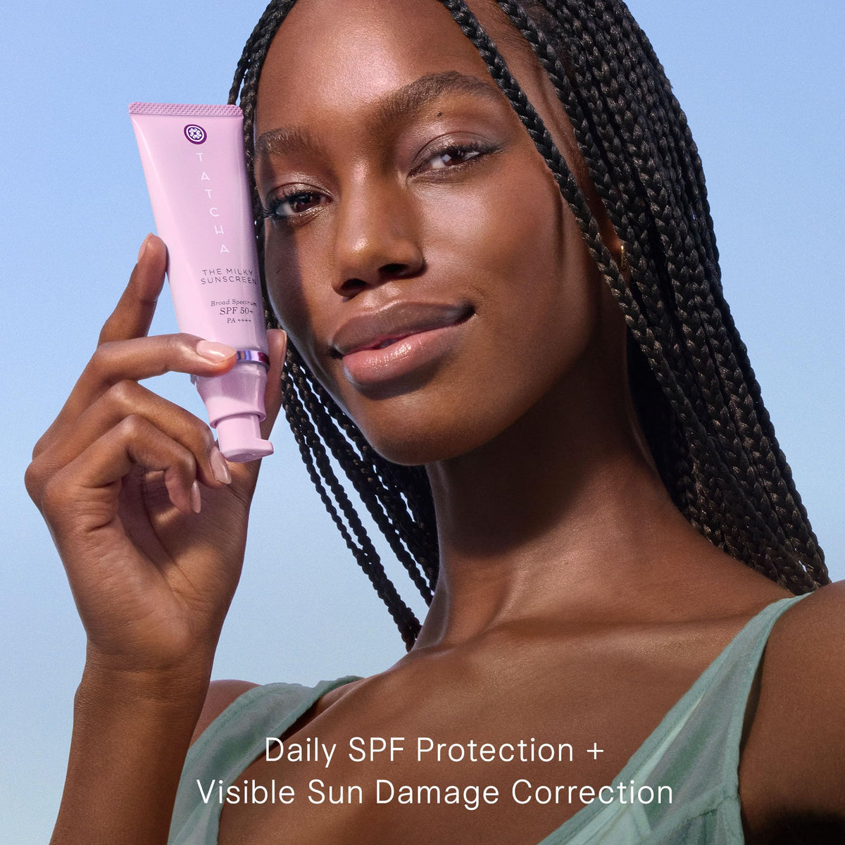 TATCHA sunscreen being dispensed from pump showing easy application